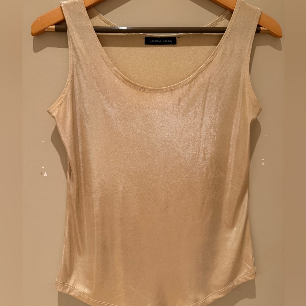 Gold shimmer scoop top.